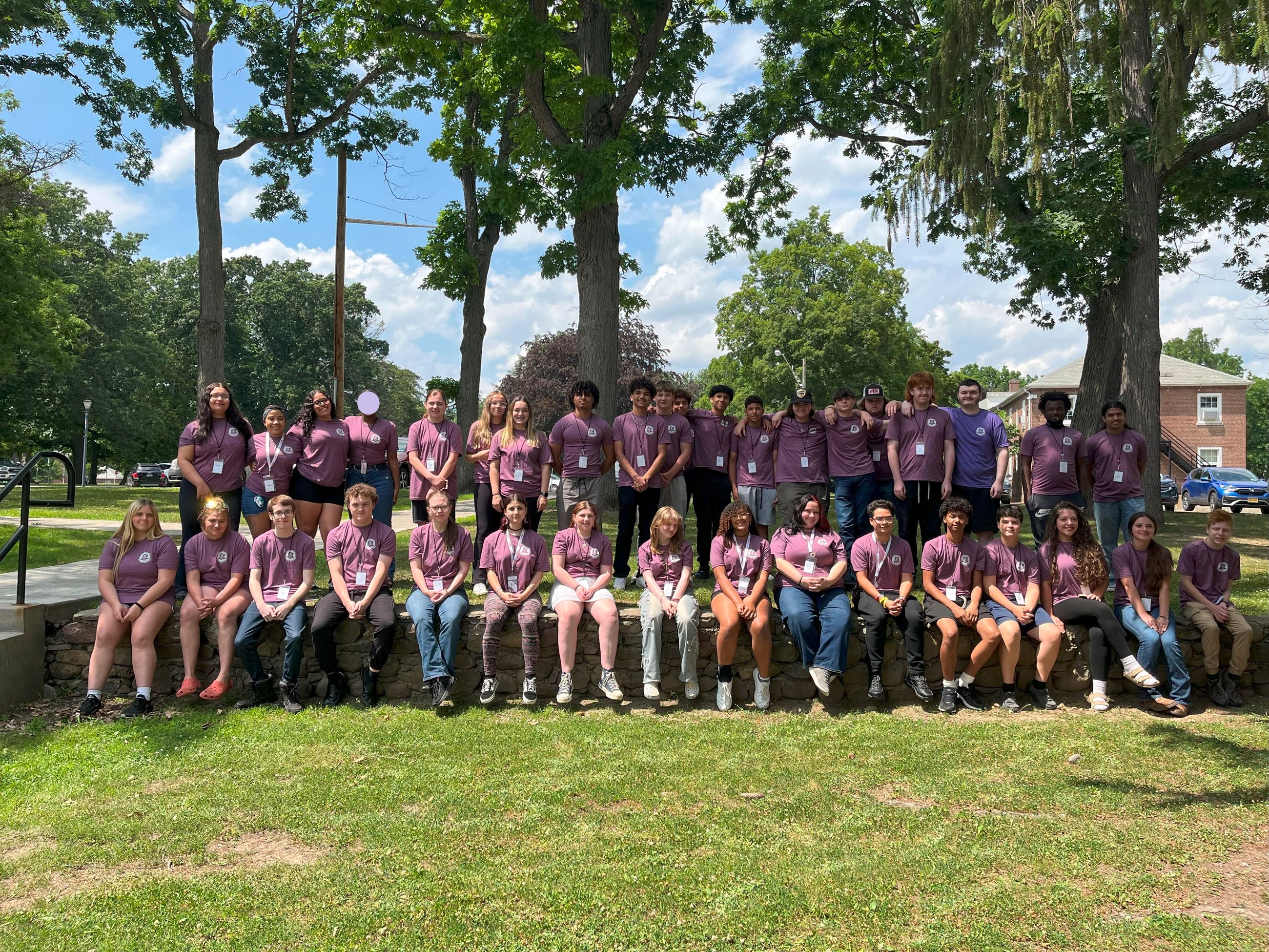 Group photo of teens wearing county tshirts