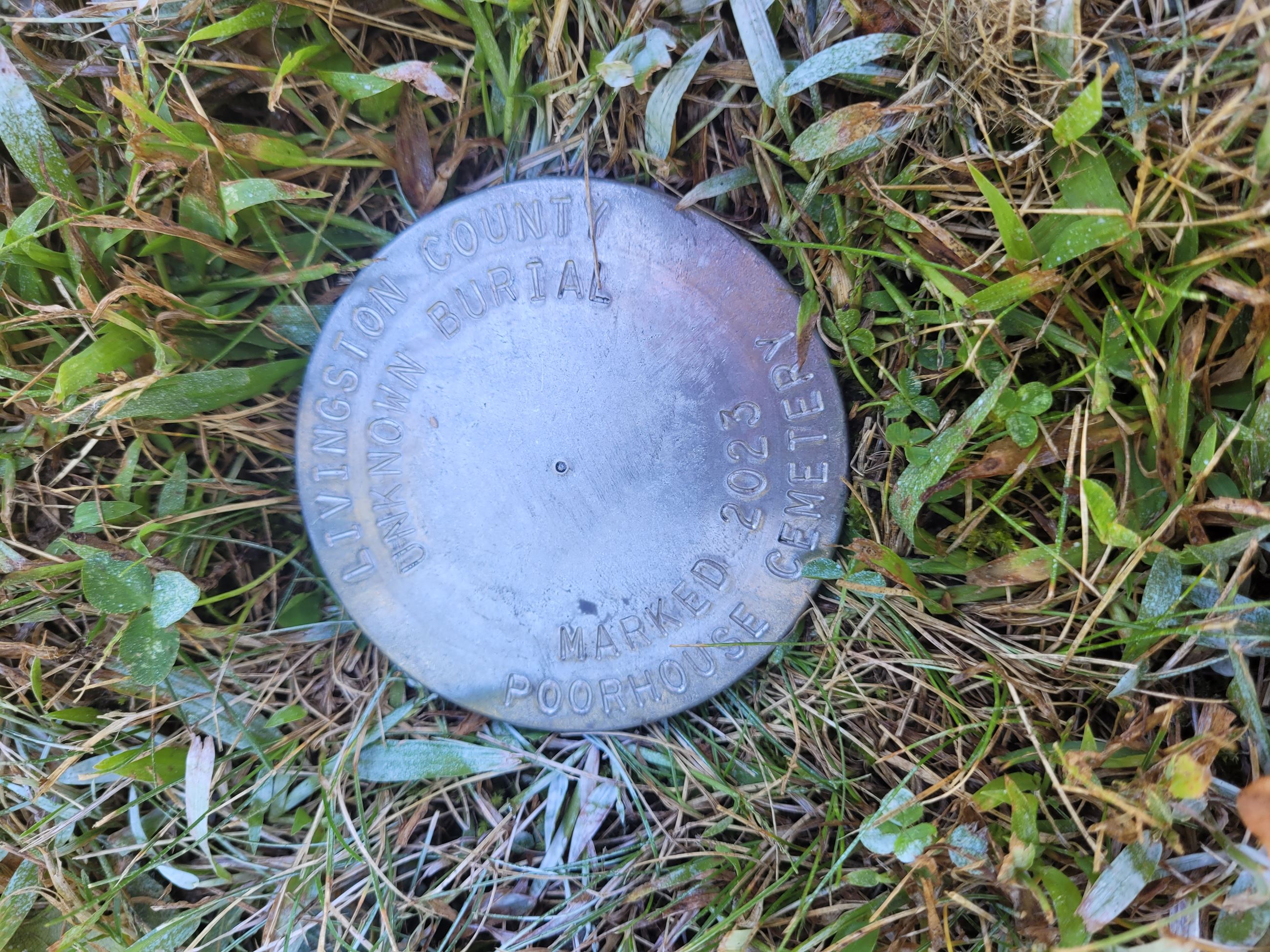 New flush disk marker at New Poorhouse Cemetery